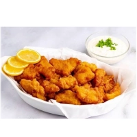 Alle visgerechten worden geserveerd met salade en brood.